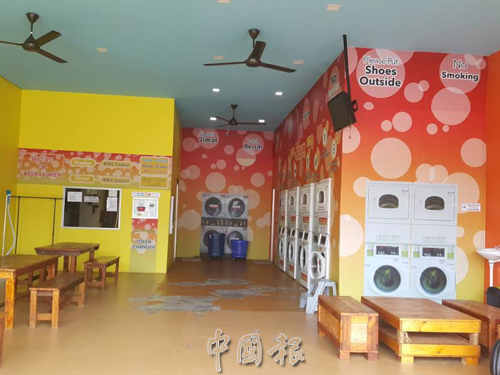 記者週三(27日)上門發現,洗衣店已移除只限穆斯林光顧的牌子。