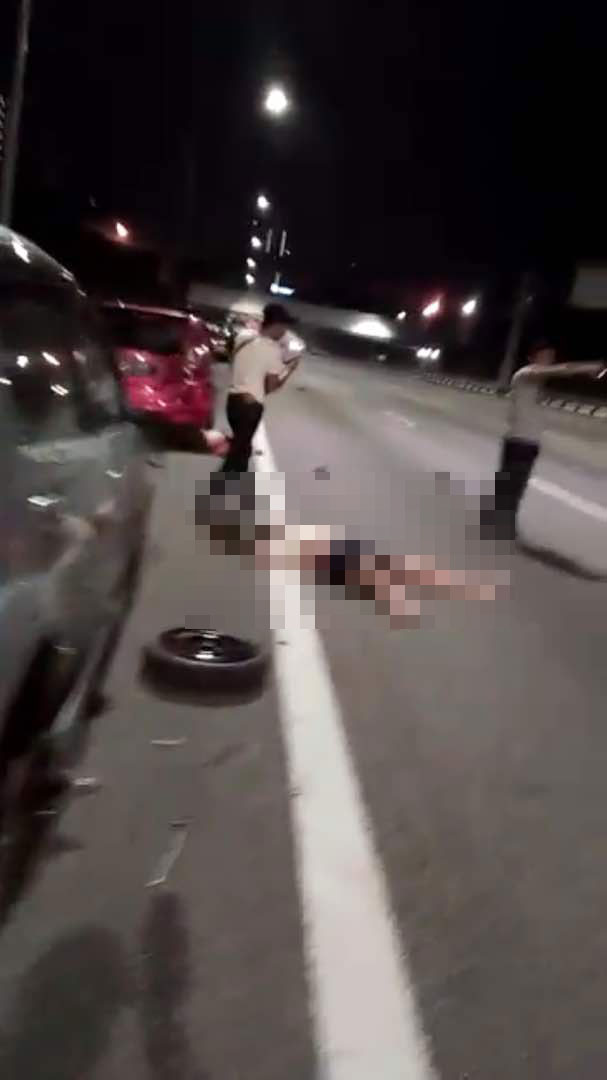 華裔一家3口在大道緊急通道更換輪胎時，被1輛一輛羅釐撞倒，釀2死1重傷。