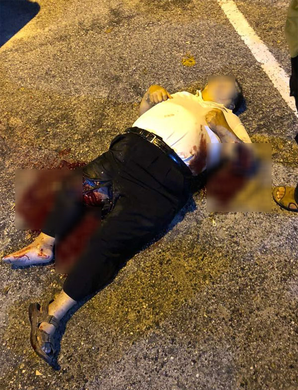 林秋強被行兇者開槍射傷後，躺在地上奄奄一息。