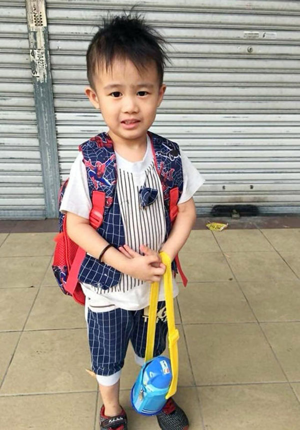 游梓彬患病前活泼可爱,也非常爱笑。(受访者提供)