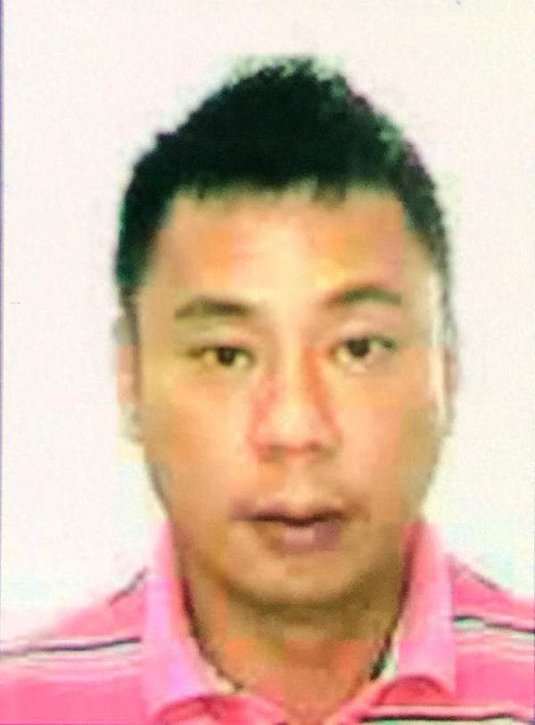 警方發布通緝犯Wong Chong Ming的照片。