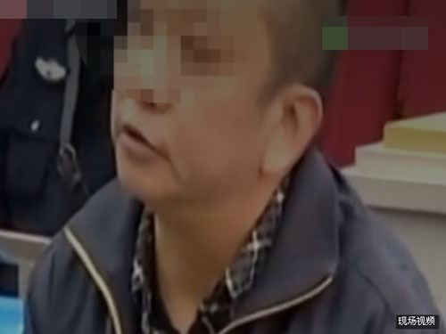 冒充“乾隆皇帝”在深圳行騙的男子劉乾珍，週一在深圳中級人民法院出庭受審。（視頻截圖） 