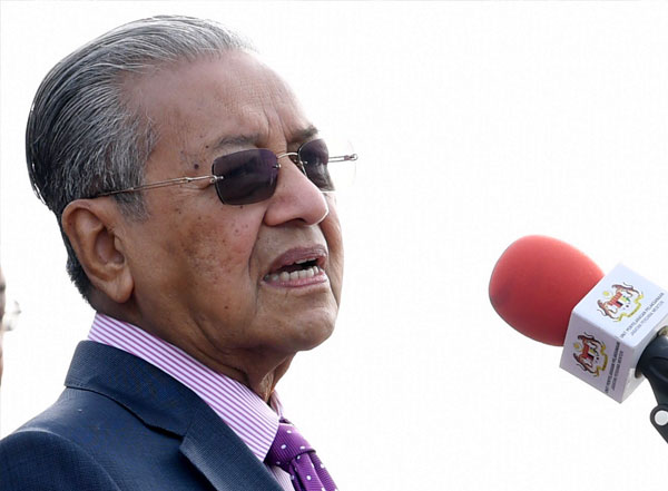 首相敦马哈迪仍会如期在今午飞往峇厘岛。