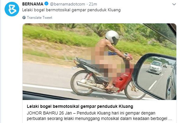 男子不顾他人眼光，在道路上“裸驾”骑摩哆。（图取自马新社推特）