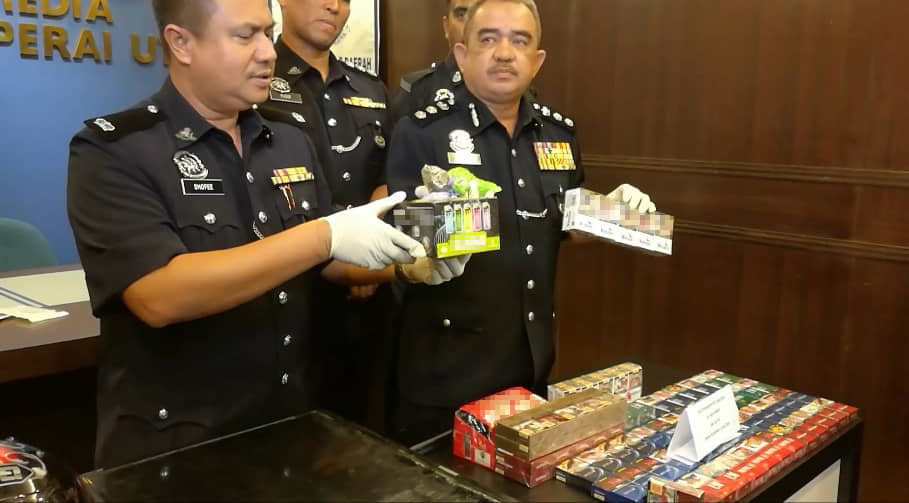 警方侦破涉及8宗餐馆爆窃案的匪党，起获90盒各牌子香烟。