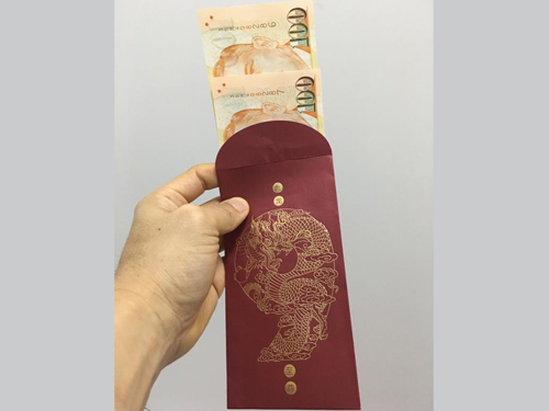 金沙职员收到豪客的200元（约600令吉）红包后，被要求上交公司。（受访者提供）