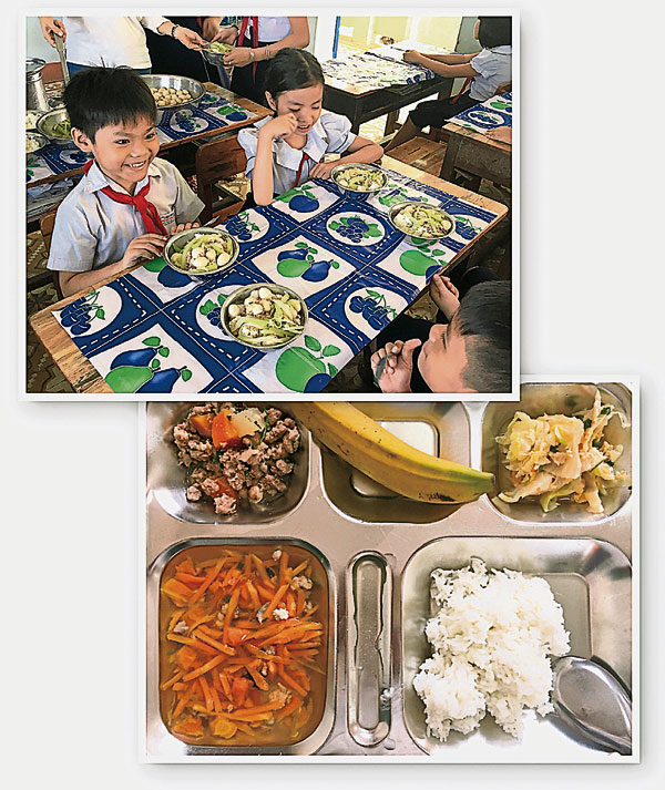孩子们正在享受营养均衡的校餐。