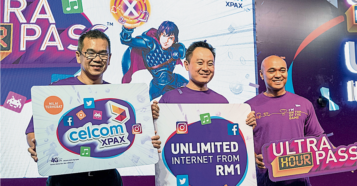 周家伟（左起）、翁书军和达伦维克托，联手推介Xpax全新配套“Ultra Hour Pass”。