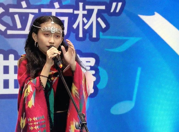 13岁的许芷妍代表大马唱进青少年组半决赛。