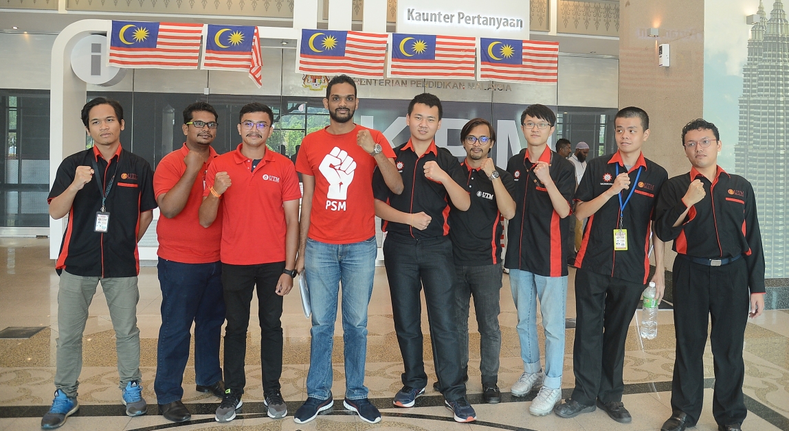 沙兰（左4起）与陈振祥率领马来西亚──日本国际理工学院学生代表会见马智礼及大学管理层。