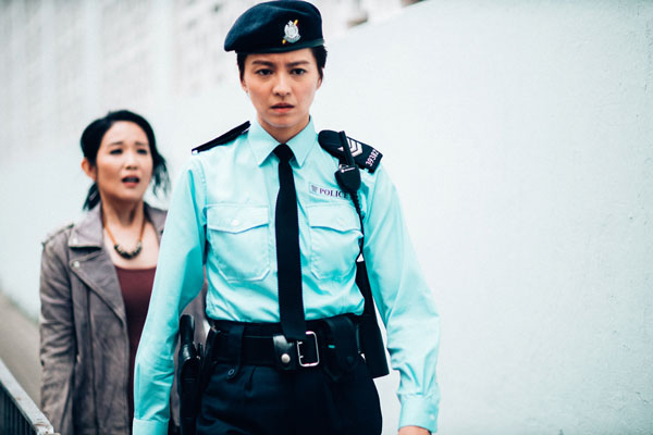 梁咏琪在喜剧片《恭喜八婆》中扮演军装警察。