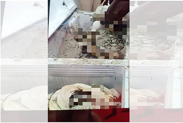 一名双手和双脚遭捆绑的女子被藏尸冰箱，上面撒满了水泥。