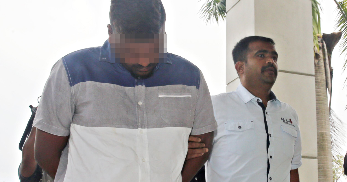 嫌犯（左）涉嫌假冒贸消局委任的拖车代理，被警方带上法庭申请延扣助查。