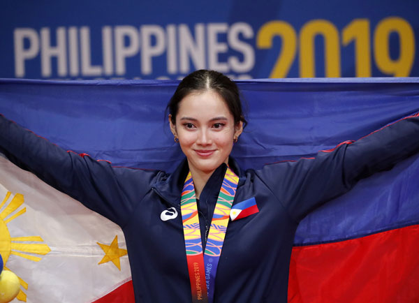 王花美为菲律宾武术队带来两枚金牌。（欧新社）