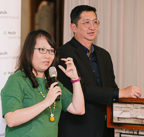 卓璟慧（左）与陆治维，出席2020年市场及投资展望汇报会。