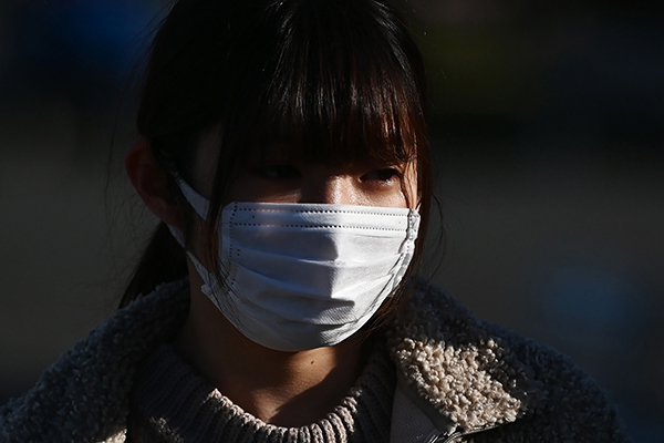 日本厚生劳动省，将无症状感染者的隔离天数，从12.5天缩至2天。图：法新社