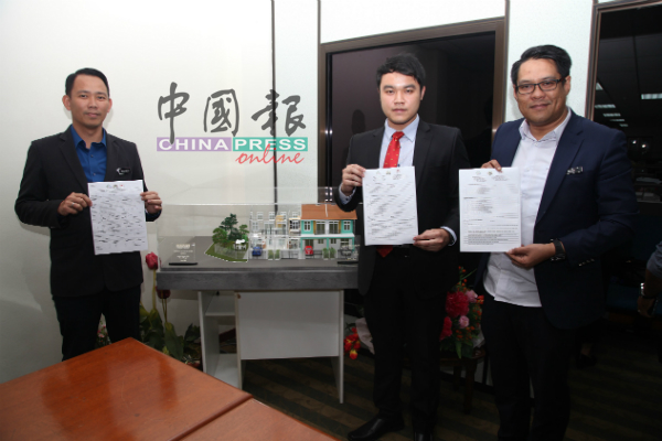 郭子毅（中）宣布第二期青年房屋计划开放申请的好消息。右为礼扎及诺曼（左）。