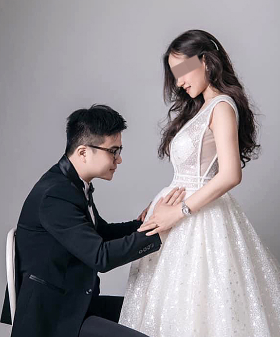 陈伟彬与孕妻的婚照。（受访者提供）