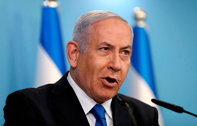 以色列总理尼丹亚胡周四举行记者会。（法新社）