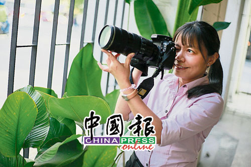 摄影是卢淑敏的本科专业，她将兴趣变成职业。（潘嘉威摄）