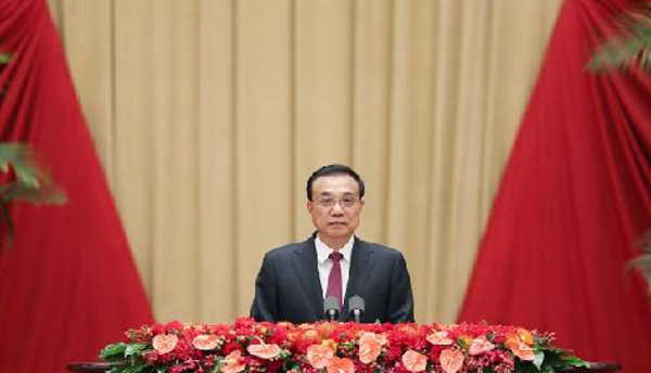 中国总理李克强称将坚定不移全面准确贯彻“一国两制”。 （新华社）