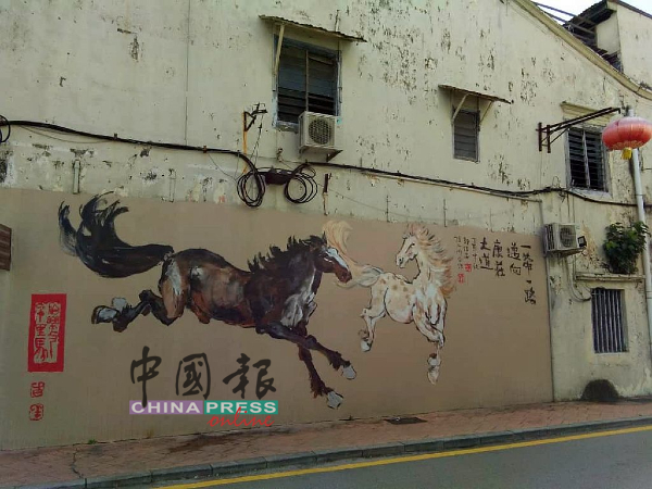 马六甲世遗老街有不同主题的壁画。