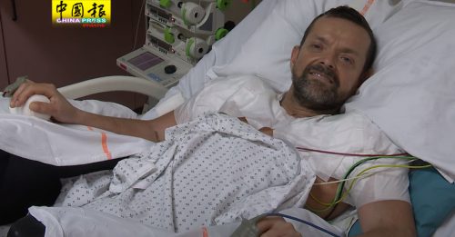 男子失去双臂20年  接受移植手术创全球先河