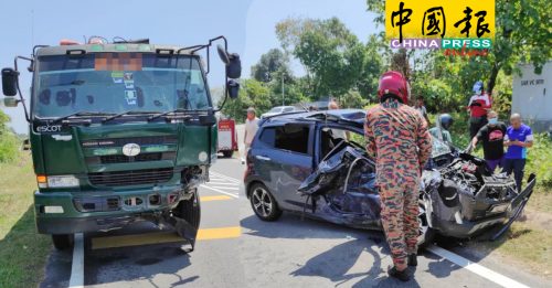 重型罗厘与车相撞     轿车损毁司机受伤