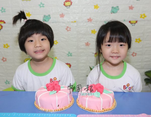 赖悠譞（左，5岁） 黄惠彬（右，5岁）