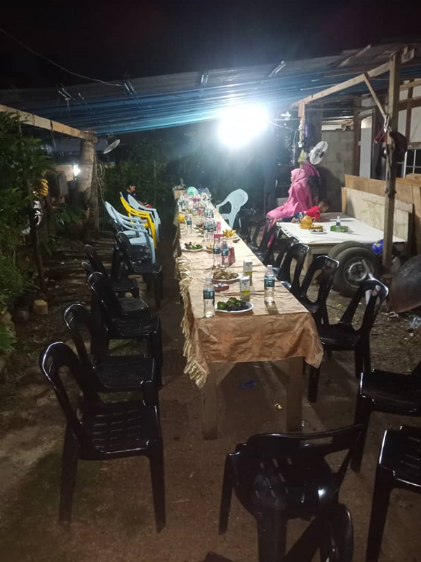 5名男女在一间甘榜住家开餐会庆祝孙子出生，违反SOP而被开罚。