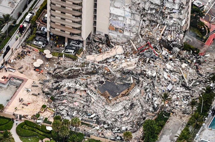 迈阿密戴德郡尚普兰大厦南栋康斗公寓的塌楼现场，让人看了触目惊心。