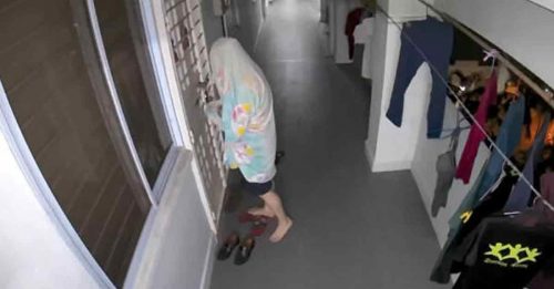 扮“幽灵”骚扰居民 男子怪行遭电眼拍下