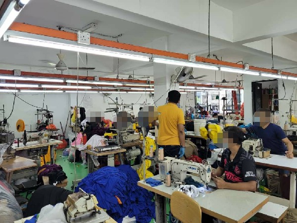 孟加拉男子透过犯罪集团，取得假临时工作准证后，联同本地人成立一家公司经营制衣生意。