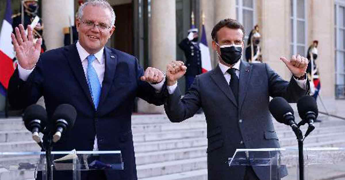 澳洲总理莫里森（左）与法国总统马克龙摄于今年6月15日。（法新社）