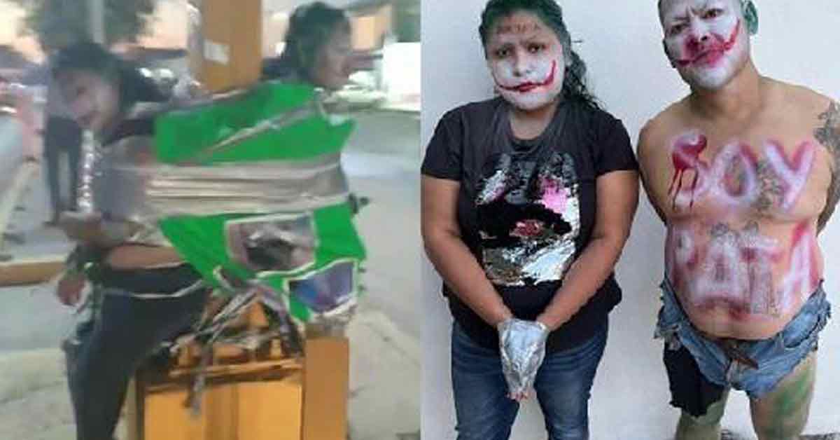 墨西哥2贼被胶带绑路灯上，脸还被画成小丑。