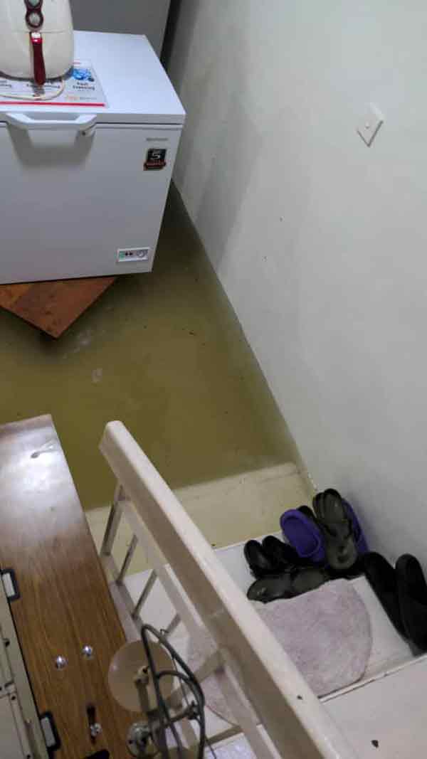 林健辉说家中水位逐渐上升。