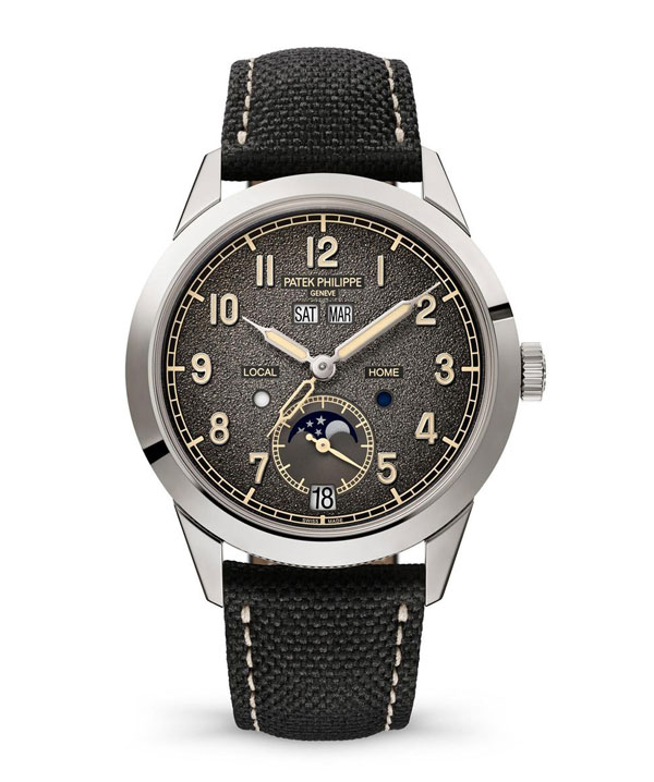 Patek Philippe编号5326G年历及两地时间腕表，不仅象征品牌首度集结旗下两项出众复杂功能的最新成果，炭灰纹理表盘也是首度出现。