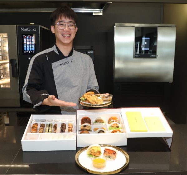 食物包装盒由设计系毕业的卢咏盈设计，俞嘉诚和另一名伙伴则负责研发食品和煮食。