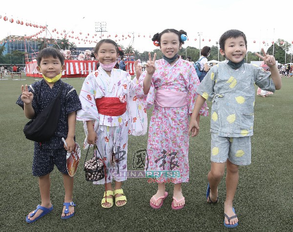小孩們穿上日本傳統服裝，參與體驗盆舞節濃濃的東瀛文化氣息。</figcaption></figure><figure id=