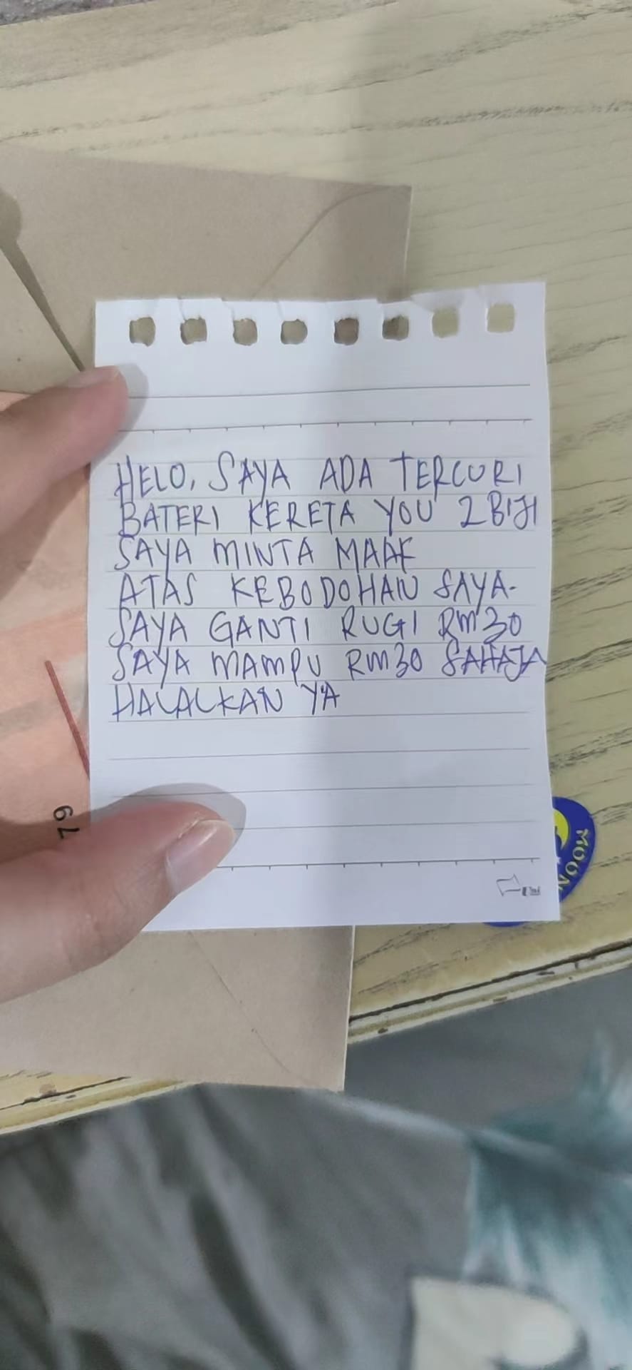 小偷写了求原谅信,为偷走2个旧电池附上30令吉赔偿。