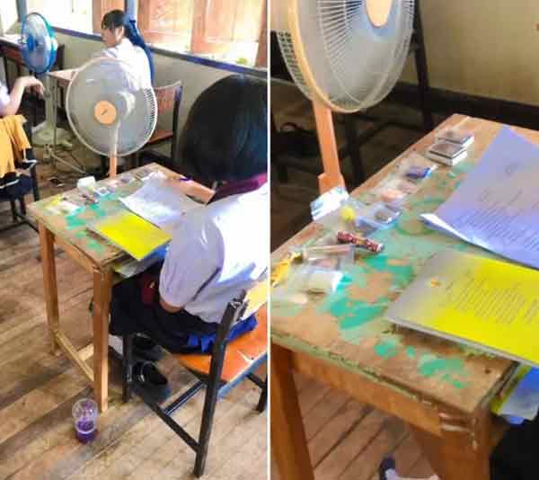 泰国有女学生考试时在桌面放了一排佛牌，在网上引起热议。
