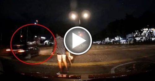 无视红绿灯过马路 外籍青年遭轿车撞飞