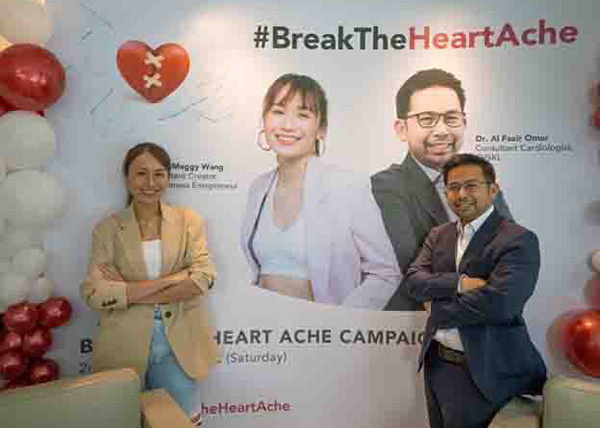 黄思嘉（左）与艾尔法兹奥玛医生出席#BreakTheHeartache活动。