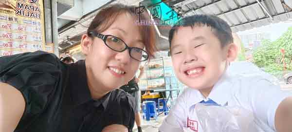 死者赖莉群及儿子唐凯恩。