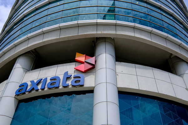 A building of Celcom Axiata Bhd., a unit of Axiata Group Bhd., in Kuala Lumpur, Malaysia, on Thursday, June 17, 2021. Mobile phone network operators Axiata Group and Telenor ASA will sign a definite agreement on the merger of their units in Malaysia 