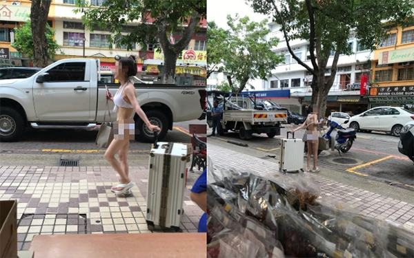 中国女子当街露胸臀
