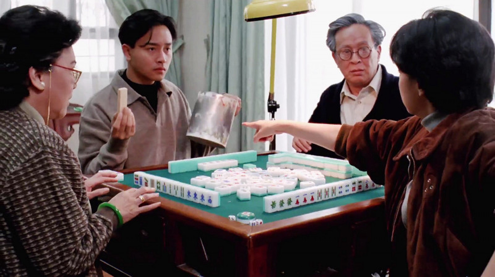 打麻将的戏是毛舜筠和张国荣一起构思。