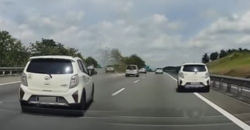 疑打瞌睡 蛇形驾驶 Axia 擦撞防护栏