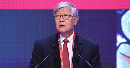 世界华商大会｜沈联涛：人民币应走出去 中美竞争 属长征