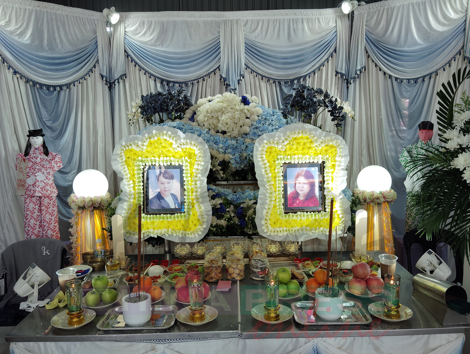 黄玉珠和李秋阳的丧礼，以佛教仪式进行。